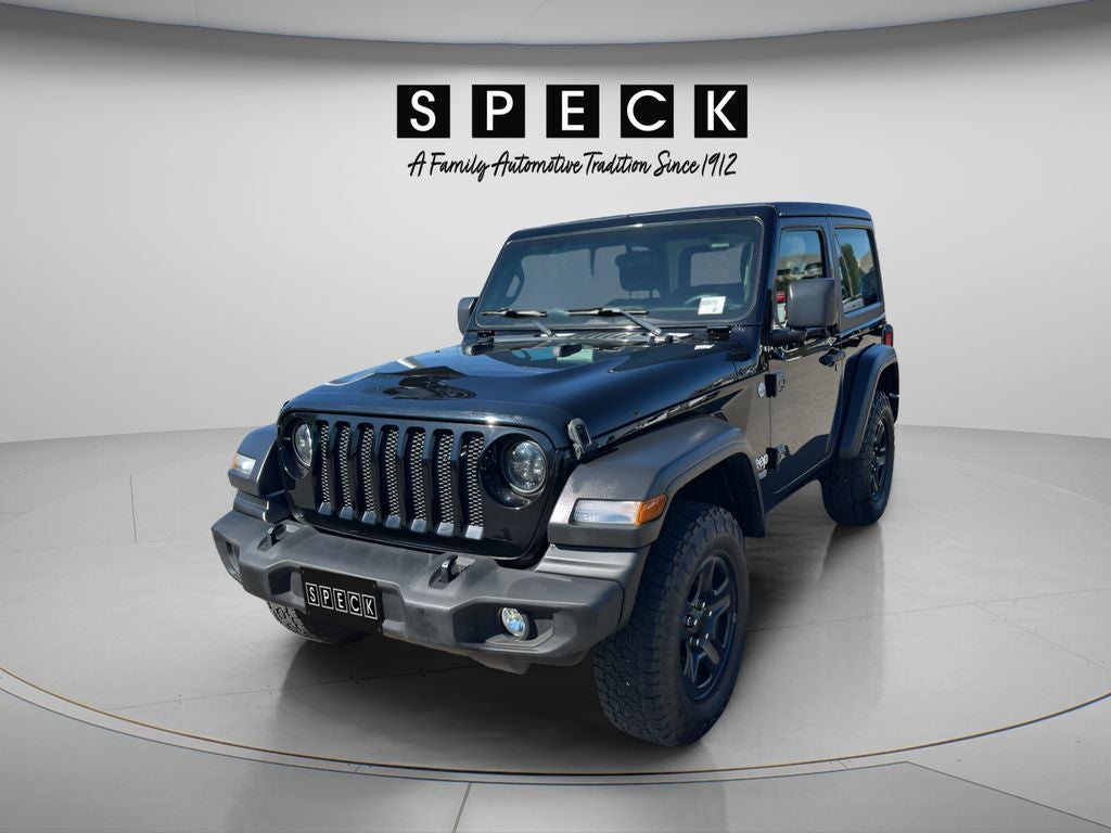 2019 Jeep Wrangler Sport in Black — front three-quarter view