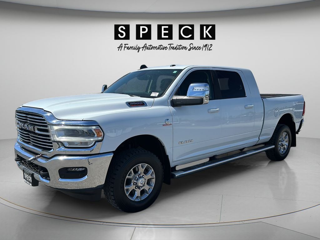 2024 RAM 3500 Laramie Mega Cab 4x4 6'4" Box in White — front three-quarter view