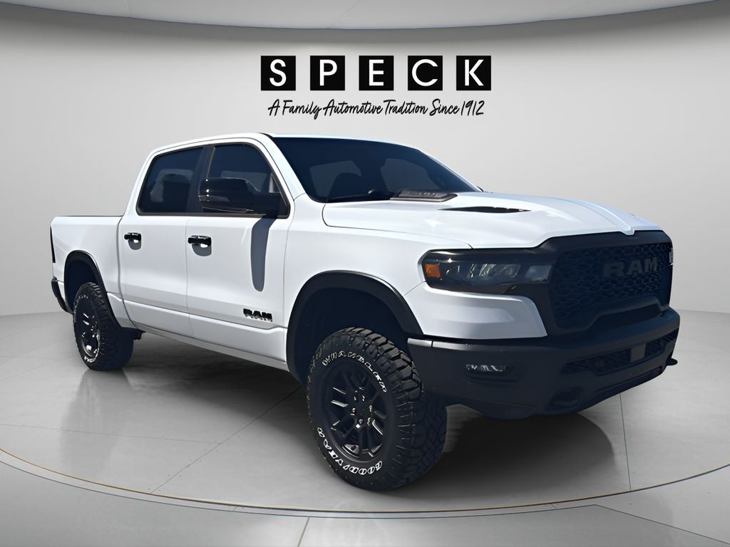 2026 RAM 1500 Rebel Crew Cab 4x4 5'7' Box in Bright White Clearcoat — front three-quarter view