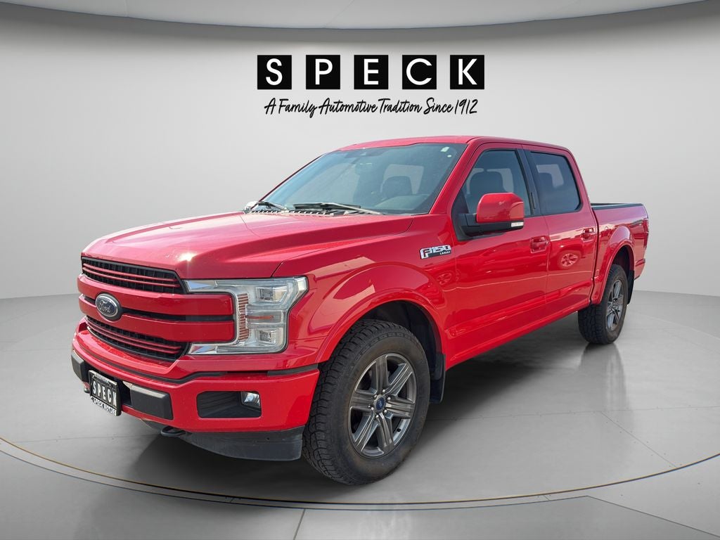 2020 Ford F-150 LARIAT in Race Red — front three-quarter view
