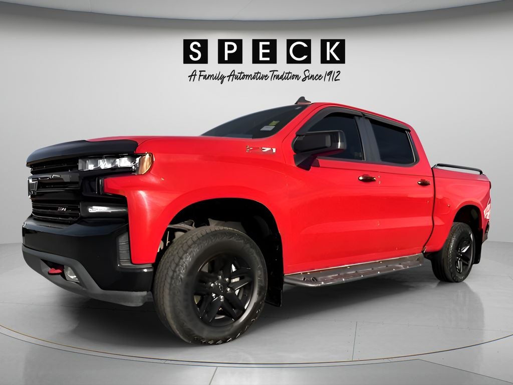 2019 Chevrolet Silverado 1500 LT Trail Boss in Red Hot — front three-quarter view