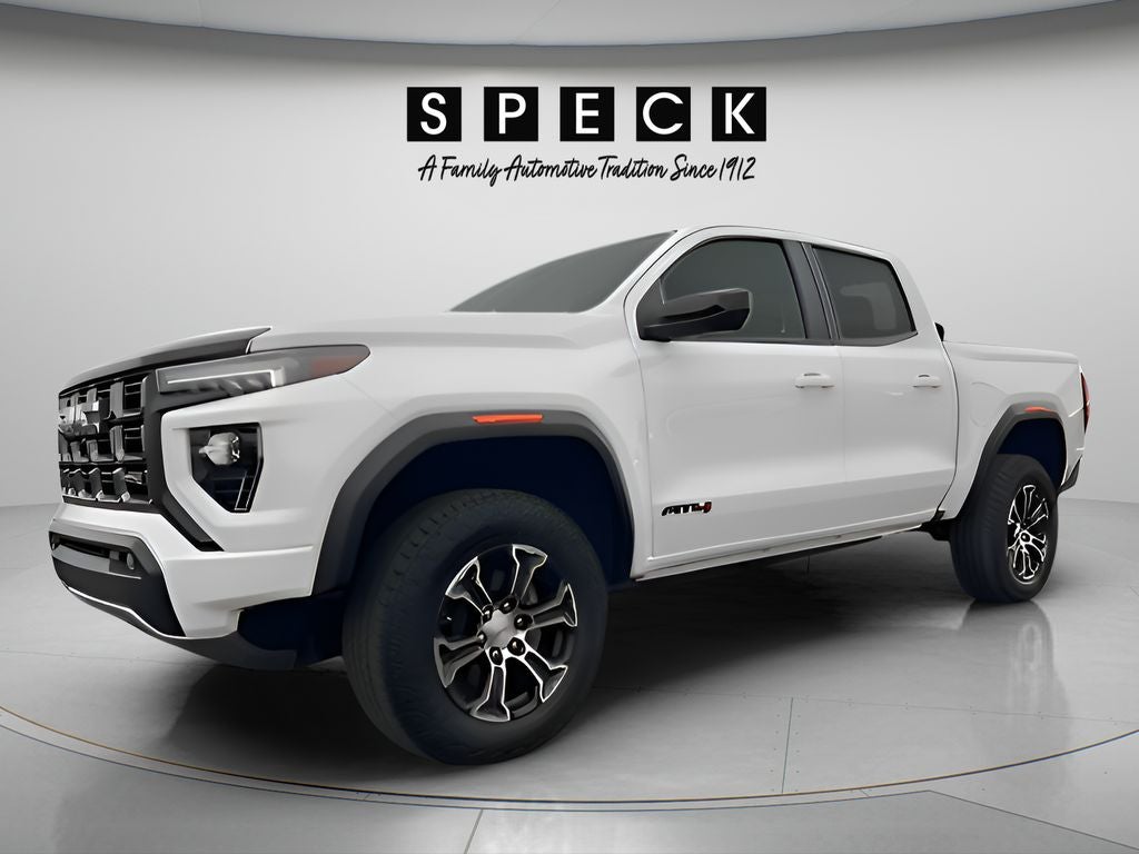 2023 GMC Canyon 4WD Crew Cab Short Box AT4 in Summit White — front three-quarter view