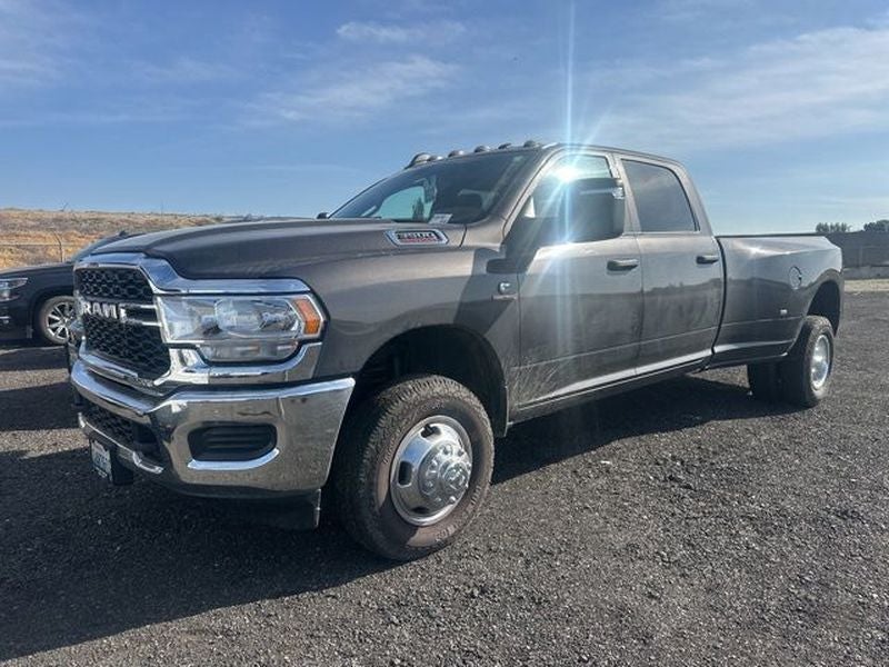 2024 RAM 3500 Tradesman Crew Cab 4x4 8' Box in Granite Crystal Metallic Clearcoat — front three-quarter view