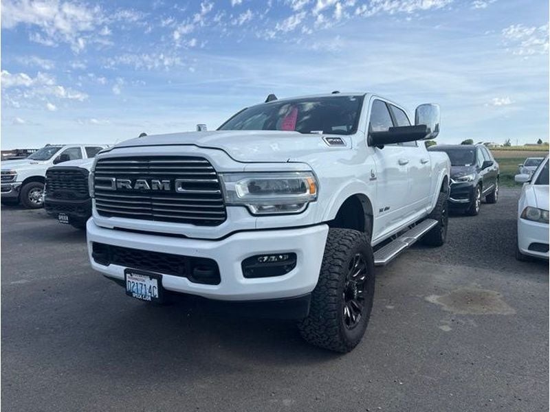 2022 RAM 2500 Laramie Mega Cab 4x4 6'4' Box in Bright White Clearcoat — front three-quarter view