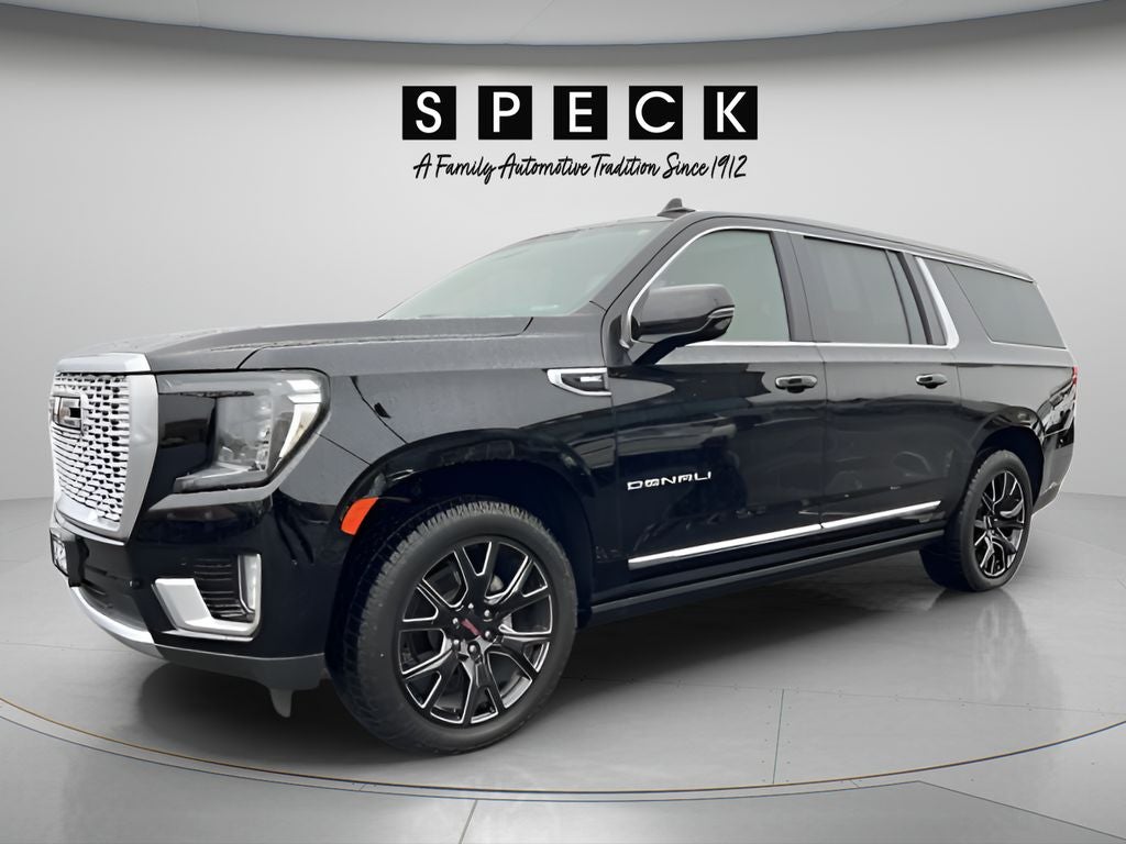 2024 GMC Yukon XL Denali in Onyx Black — front three-quarter view